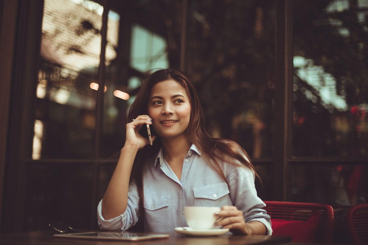 Taking a client call from a cafe table