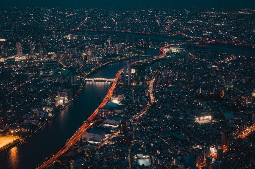 A river city seen from above late at night