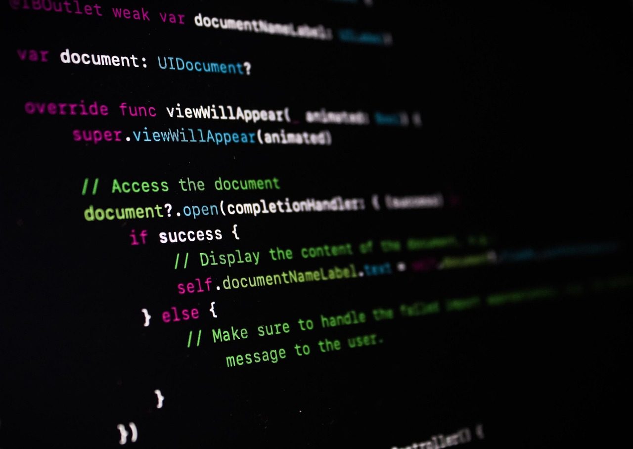 Syntax-coloured source code on a black editor screen